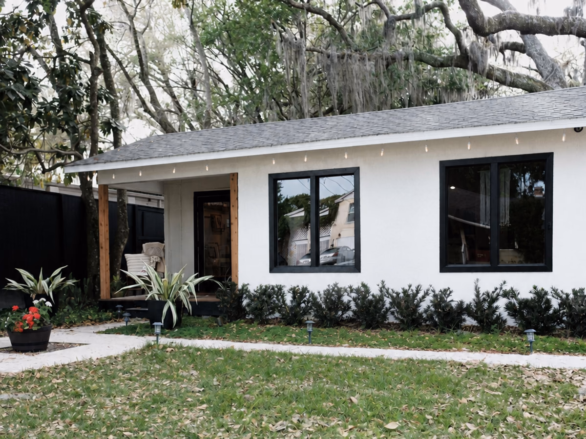 Landscaped single-story home with a level front entry